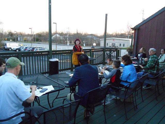 [Toastmaster Meg begins meeting]